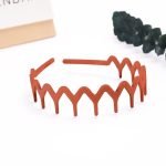 serre tete dent homme rouge