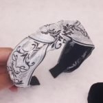 serre tete fleurs blanc noir