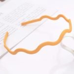 serre tete homme abricot