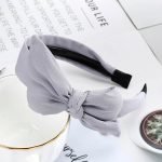 serre tete noeud gris retro