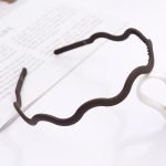 serre tete unisex marron